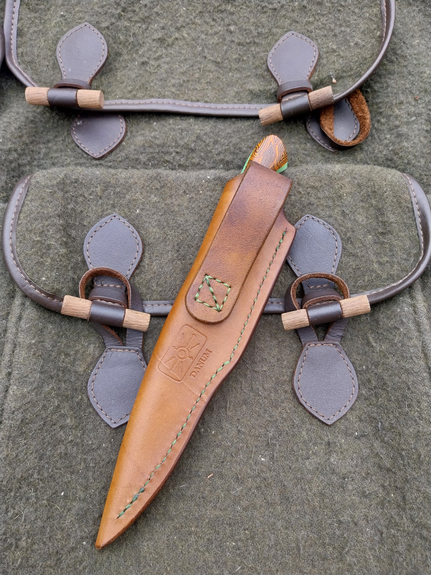 Muntjac Catcher Orange and Black Damascus G10 with glow in the dark liners