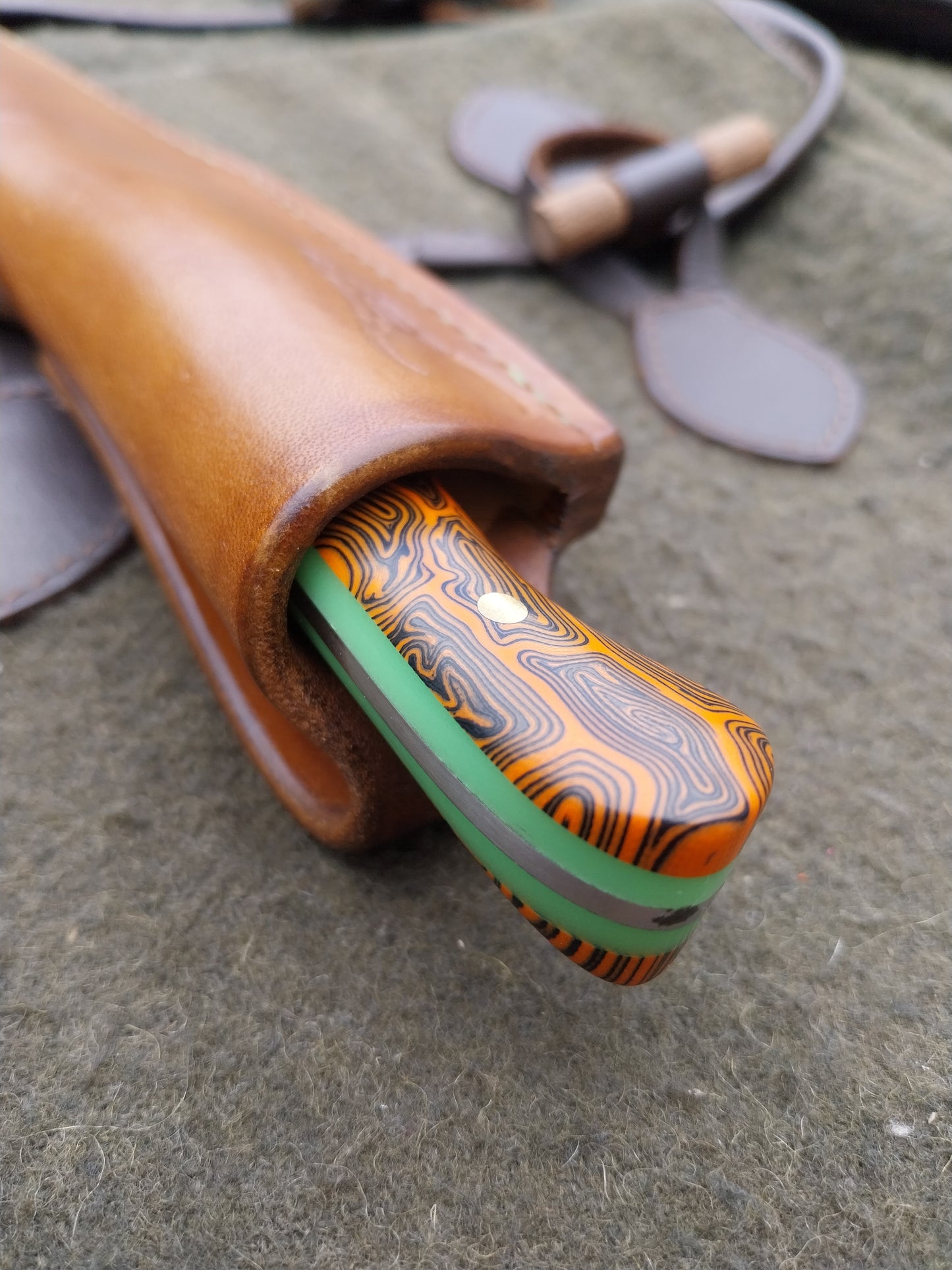 Muntjac Catcher Orange and Black Damascus G10 with glow in the dark liners