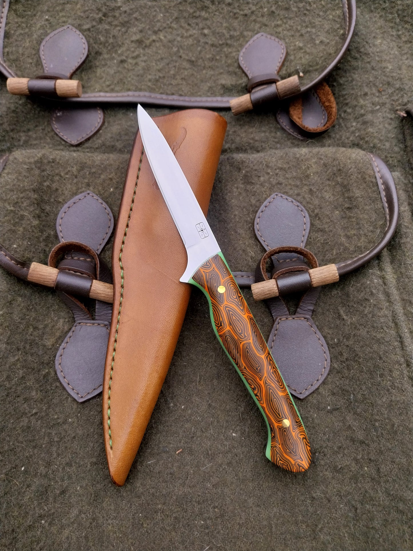 Muntjac Catcher Orange and Black Damascus G10 with glow in the dark liners