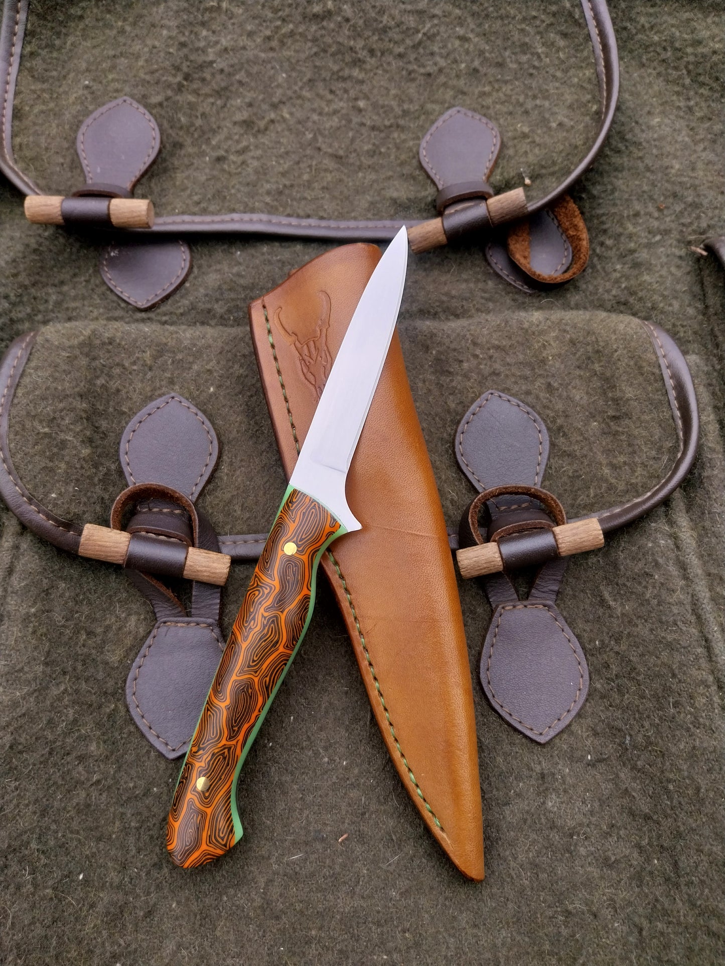 Muntjac Catcher Orange and Black Damascus G10 with glow in the dark liners