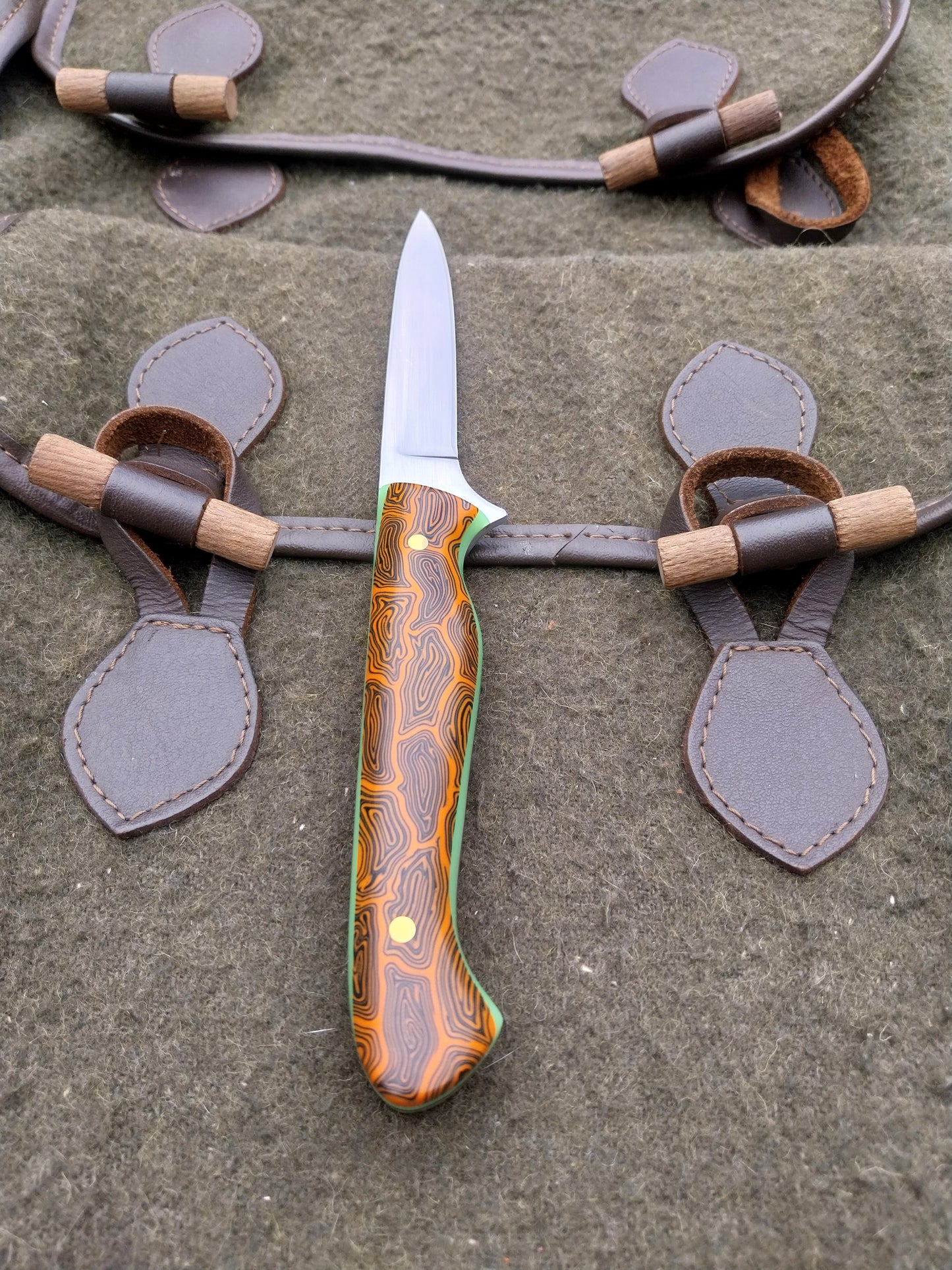 Muntjac Catcher Orange and Black Damascus G10 with glow in the dark liners