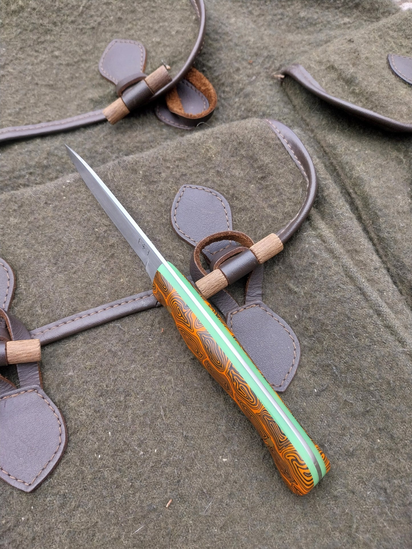 Muntjac Catcher Orange and Black Damascus G10 with glow in the dark liners